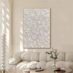 M870 artwork above a boucle sofa