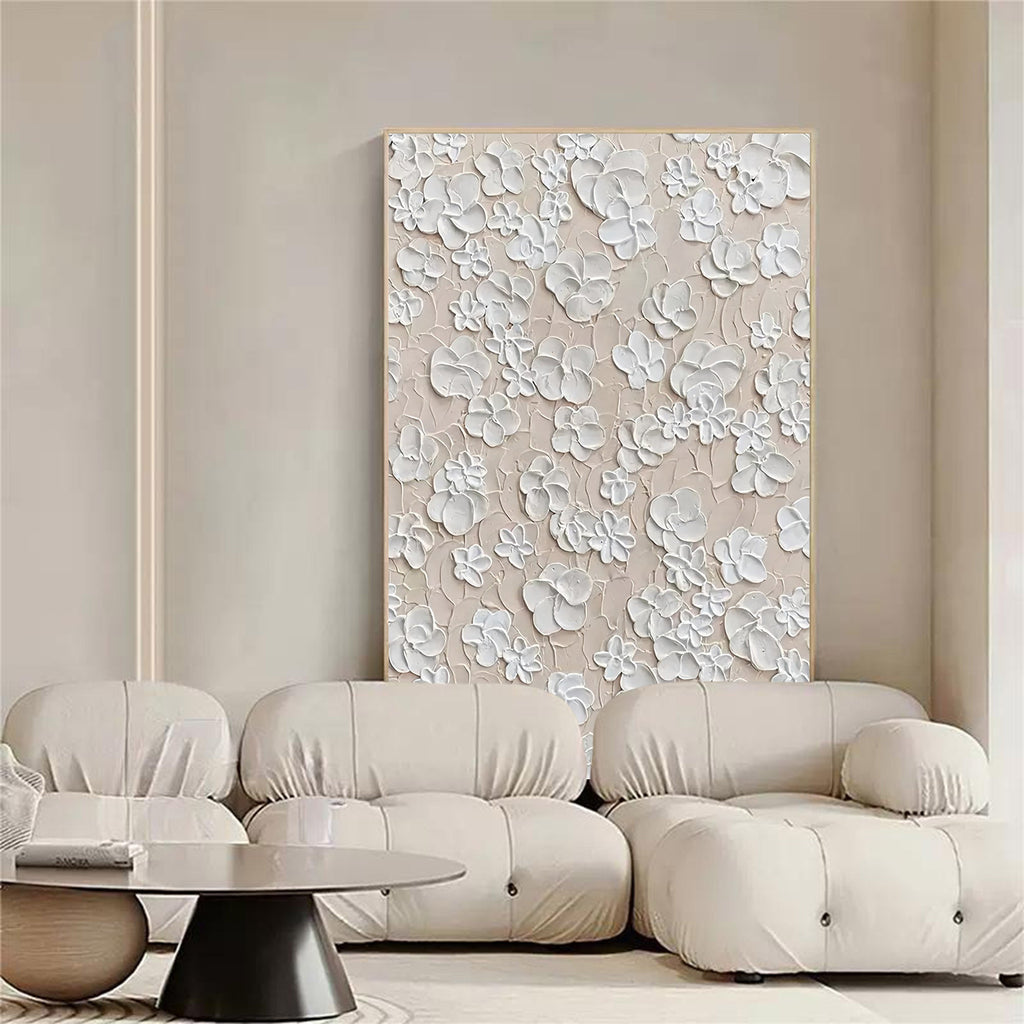 M870 artwork above a cream sofa